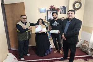 دیدار رئیس شبکه بهداشت و درمان با خانواده شهدا